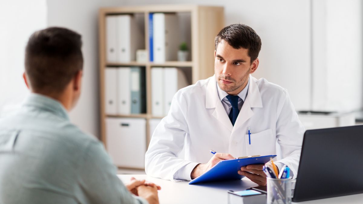 A man consulting with his doctor during Suboxone treatment.